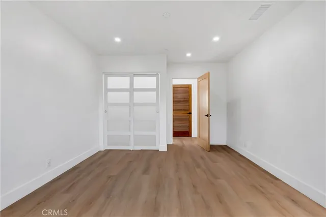 a view of a refrigerator in a kitchen