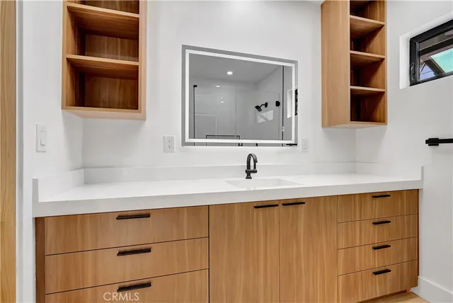 a front view of house with small garden