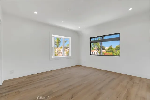 a backyard of a house with lots of green space