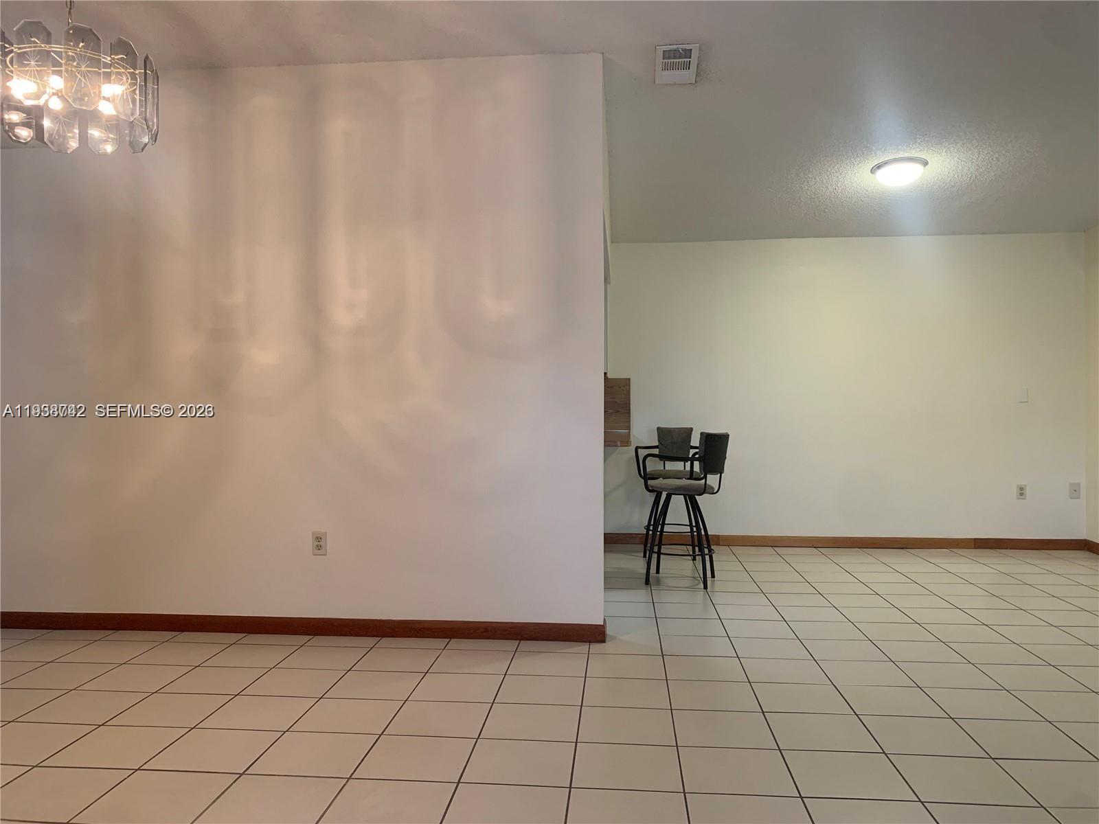 1261 Southwest 138th Court Miami, FL 33184 - Photo 2 of 11 a view of an empty room