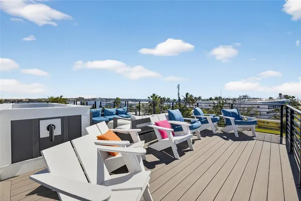 a view of a terrace with furniture