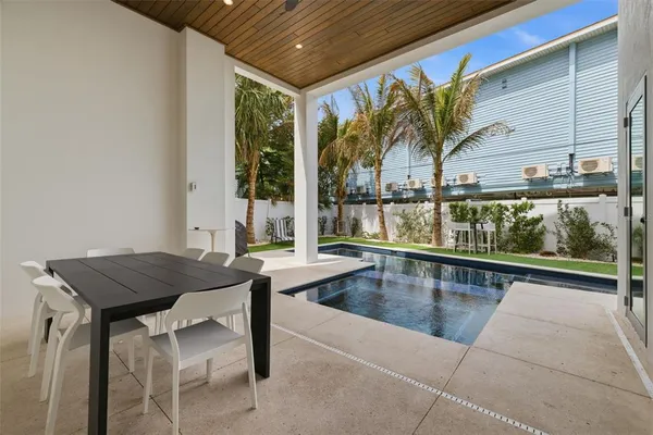 a view of a house with a swimming pool