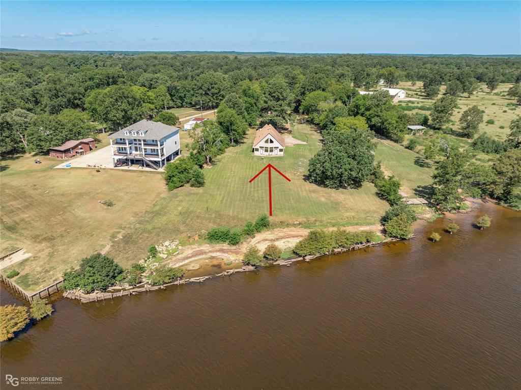 Drone / aerial view of a Home and Caddo Lake 