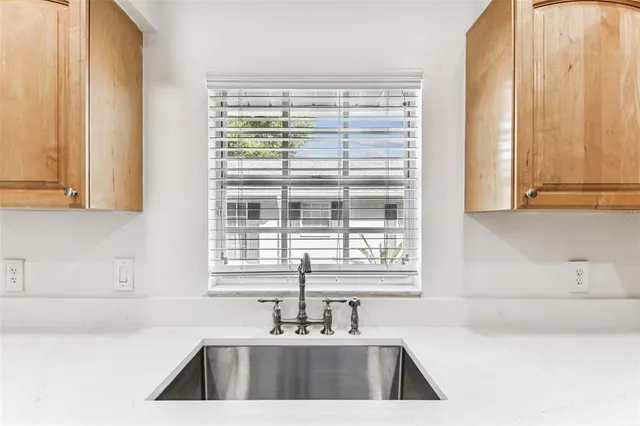 a bathroom with a bathtub and a sink