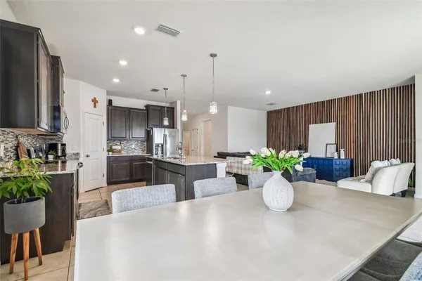 a view of a living room and dining room