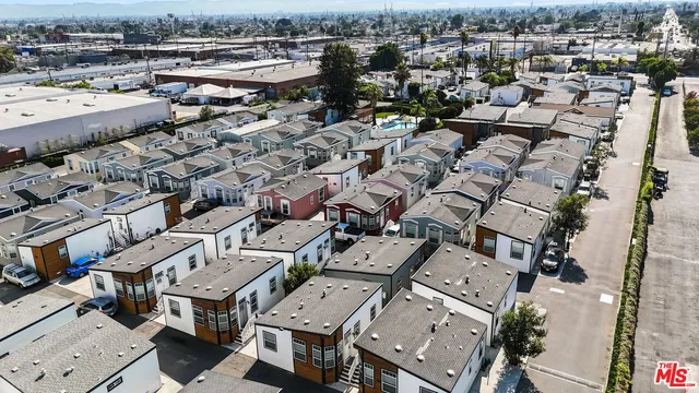 an aerial view of a city with lots of residential buildings