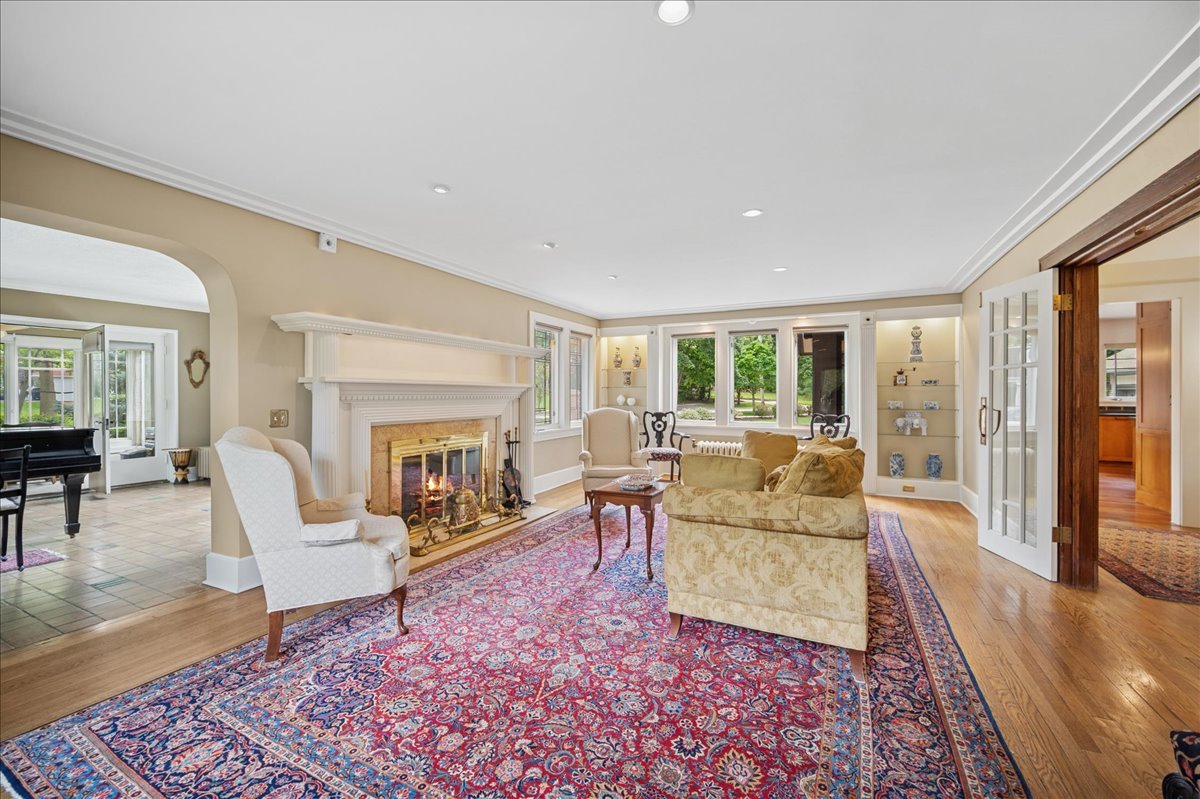 100 Old Green Bay Road Winnetka, IL 60093 - Photo 21 of 60 a living room with furniture and a fireplace