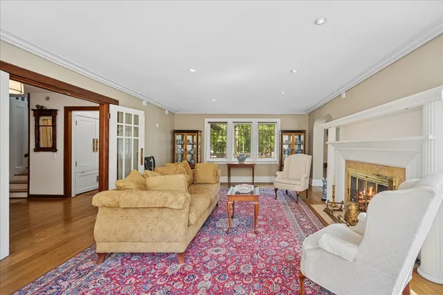 a bathroom with a sink a mirror and a window