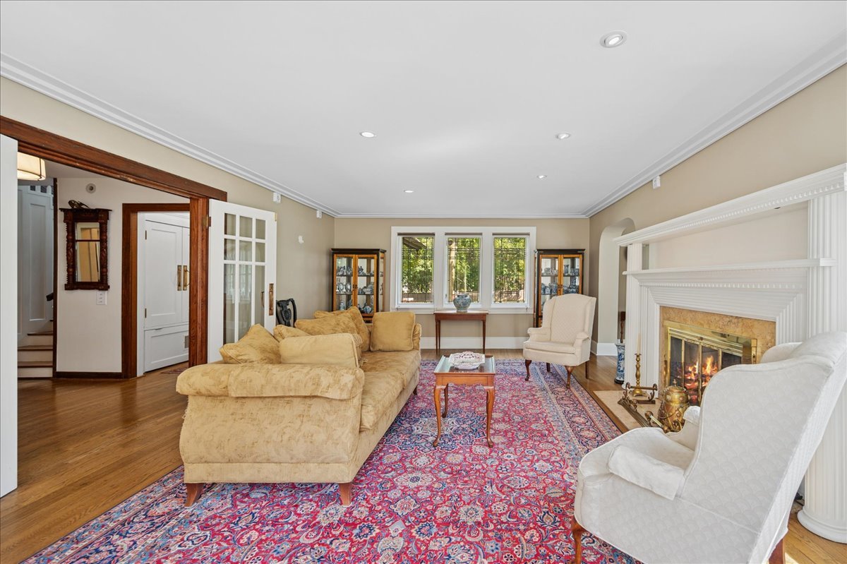 100 Old Green Bay Road Winnetka, IL 60093 - Photo 23 of 60 a living room with furniture and a fireplace
