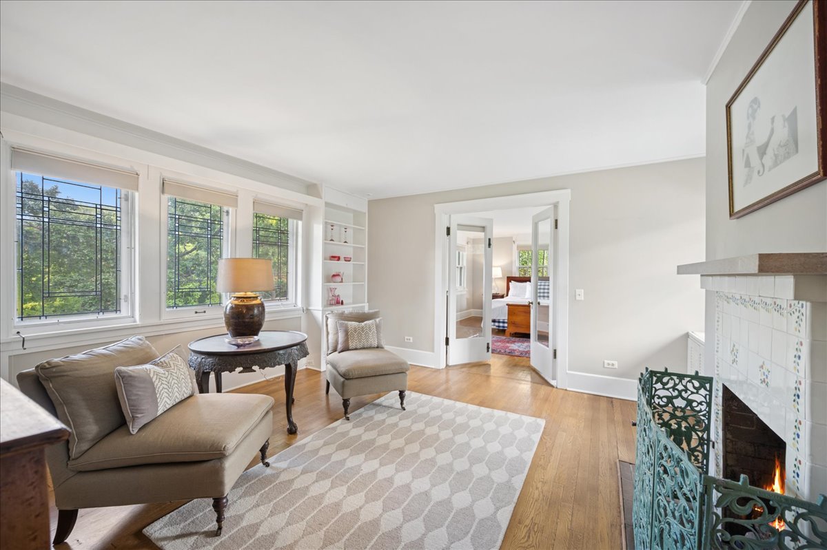 100 Old Green Bay Road Winnetka, IL 60093 - Photo 29 of 60 a living room with furniture and a fireplace