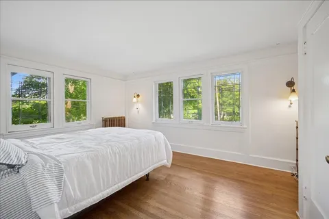 a view of a hallway view with staircase