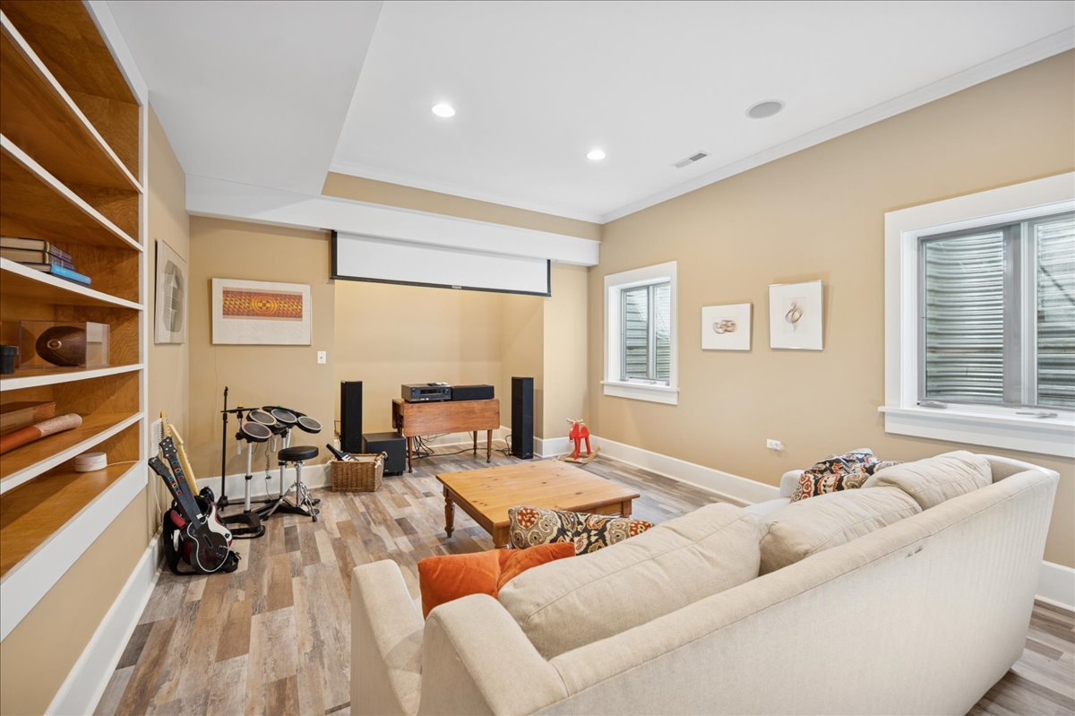 100 Old Green Bay Road Winnetka, IL 60093 - Photo 45 of 60 a living room with furniture floor to ceiling window and a flat screen tv
