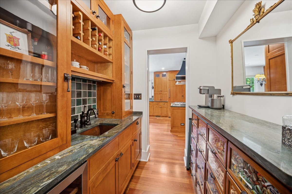 100 Old Green Bay Road Winnetka, IL 60093 - Photo 9 of 60 a kitchen with counter top space and windows