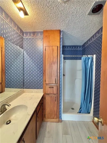 an aerial view of houses with yard