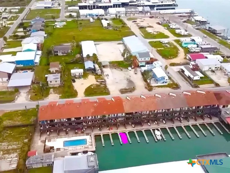 440 15th Street Port O'Connor, TX 77982 - Photo 31 of 40 an aerial view of houses with yard