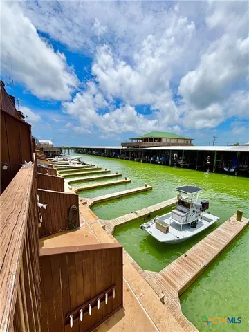 a view of a swimming pool with a lake view
