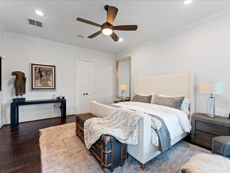 7 Ivy Castle Court Spring, TX 77382 - Photo 22 of 45 a bedroom with a bed wooden floor and window