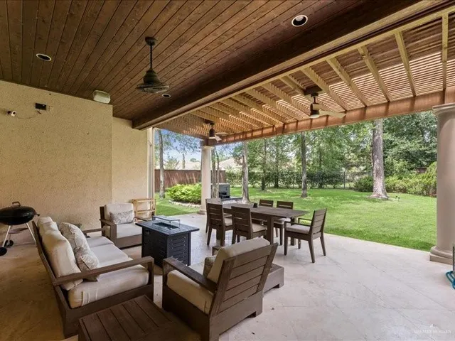 a outdoor living space with furniture and garden view