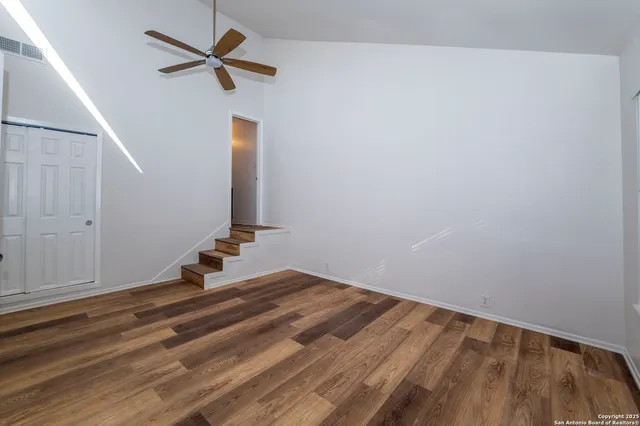 a view of a room with rack and wooden floor