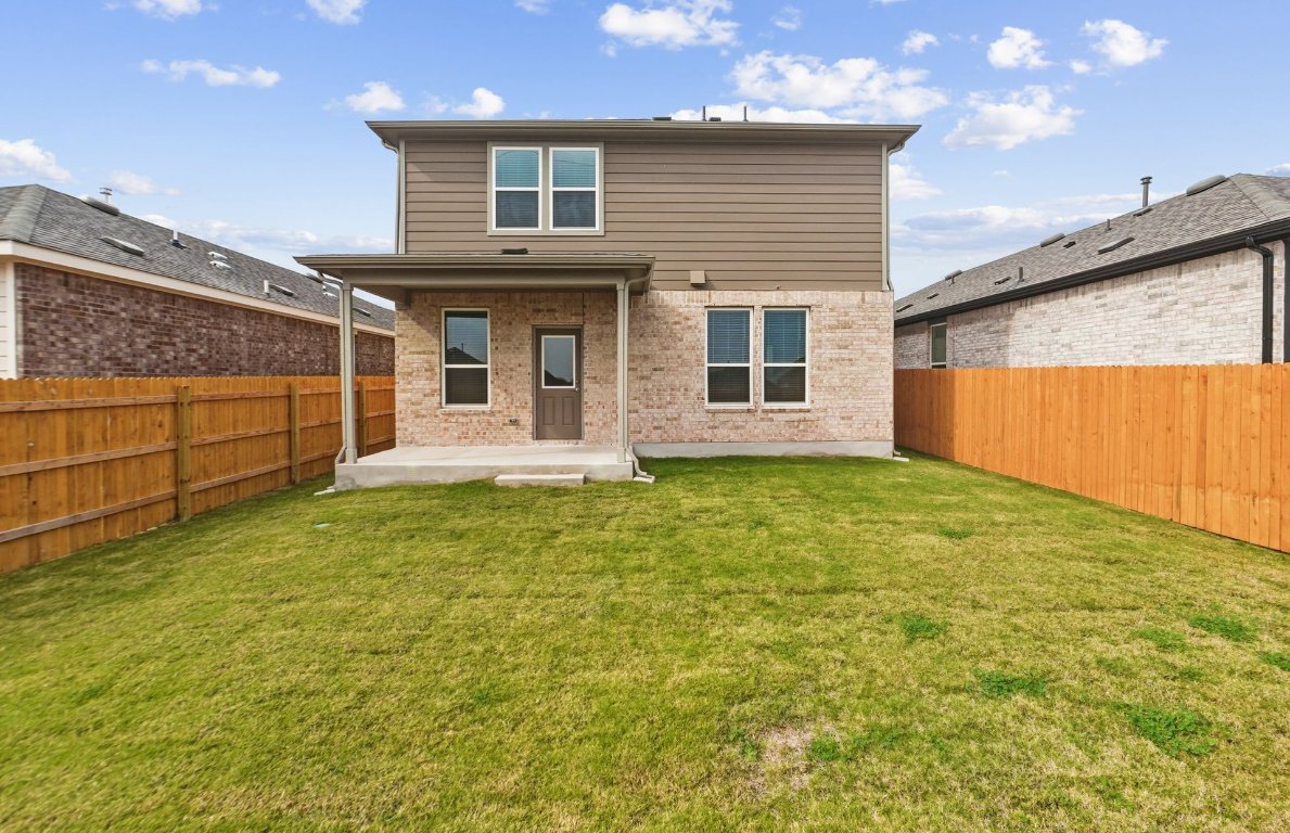 480 Tailwind Drive Kyle, TX 78640 - Photo 14 of 17 a front view of house with yard
