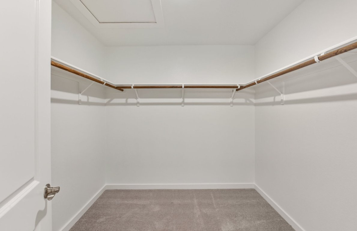 480 Tailwind Drive Kyle, TX 78640 - Photo 9 of 17 a view of an empty walk in closet