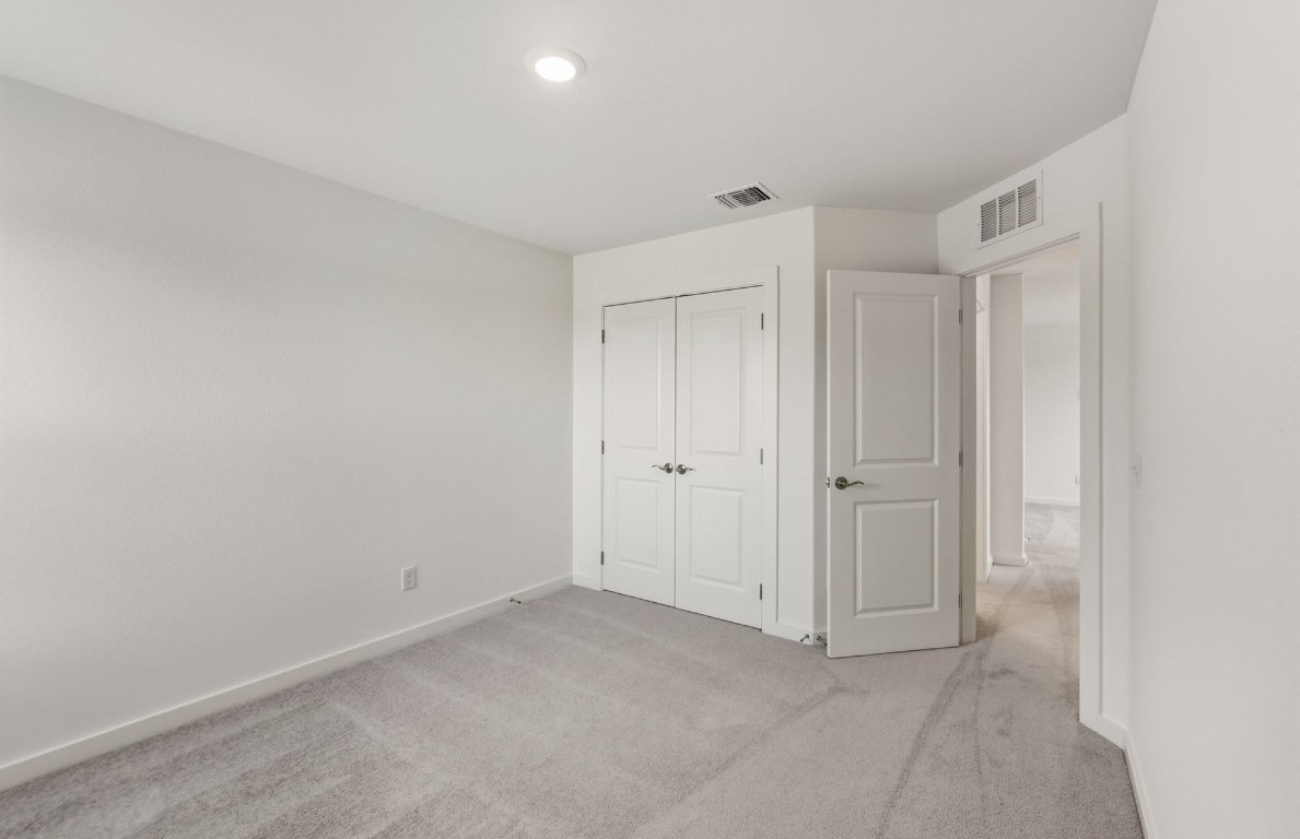 480 Tailwind Drive Kyle, TX 78640 - Photo 10 of 17 a view of an empty room