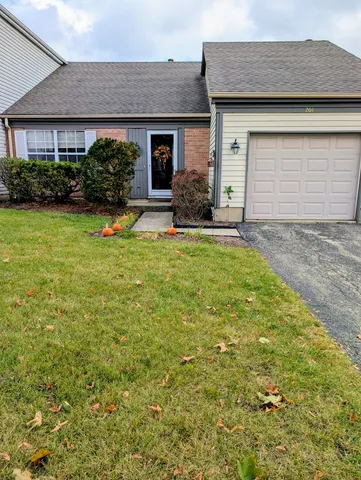 a house view with a garden space