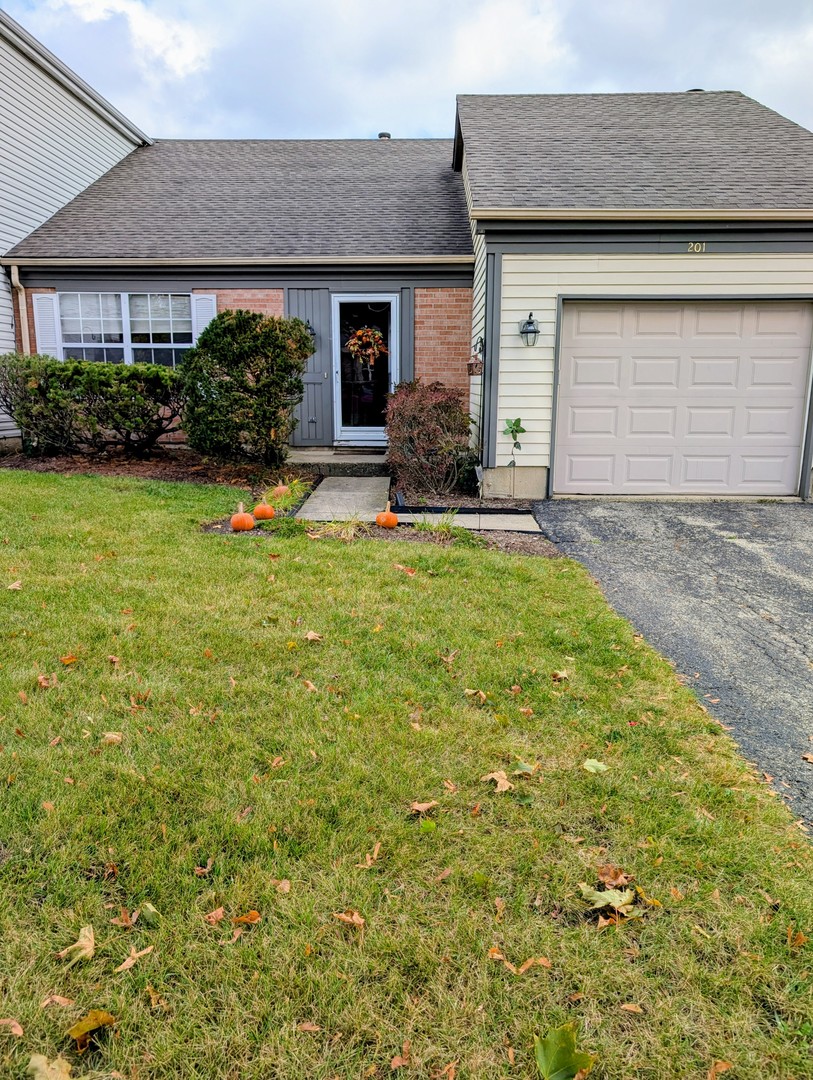 a house view with a garden space