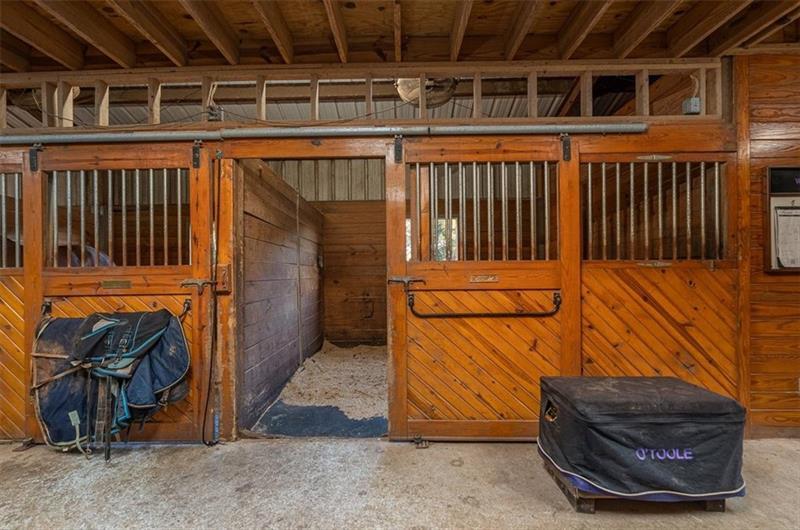 3055 A Spring Hill Drive Monroe, GA 30656 - Photo 16 of 65 a view of a porch with a door and a rug