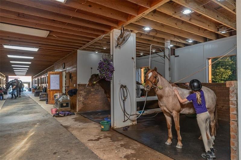 3055 A Spring Hill Drive Monroe, GA 30656 - Photo 19 of 65 a view of a room with gym equipment