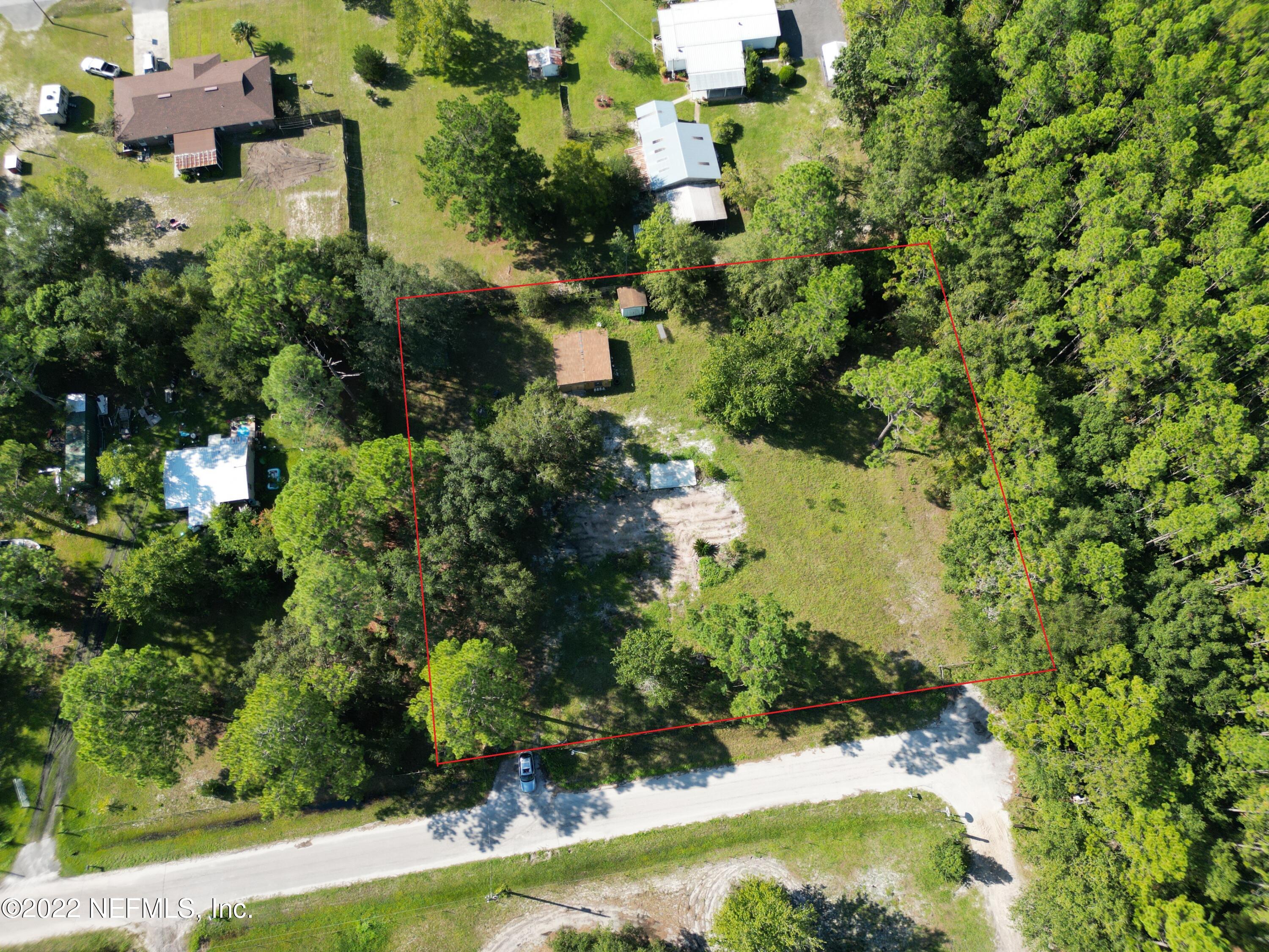 2268 D E Long Road Macclenny, FL 32063 - Photo 12 of 14 an aerial view of residential house with yard and outdoor seating