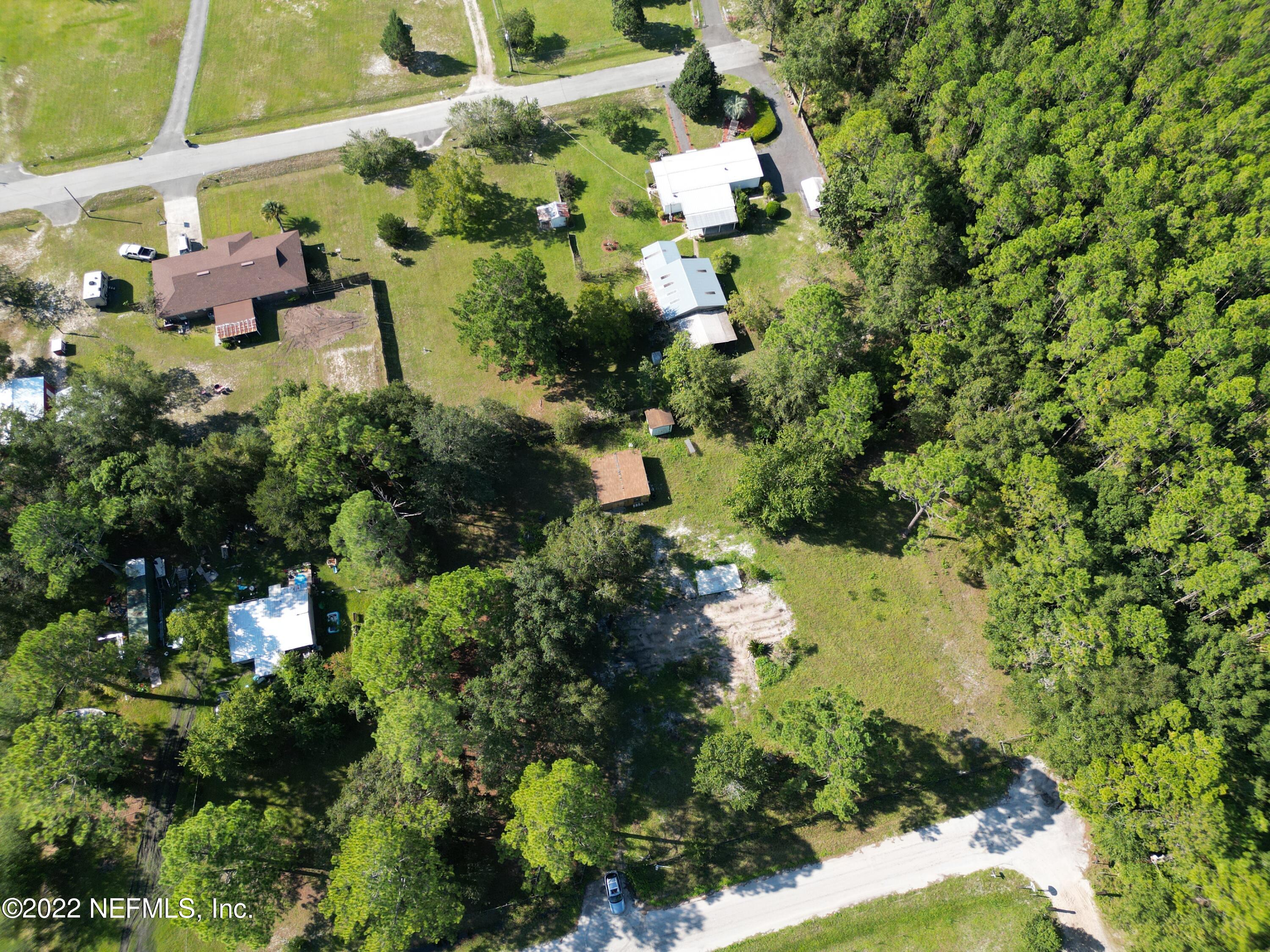 2268 D E Long Road Macclenny, FL 32063 - Photo 10 of 14 an aerial view of a house with a yard