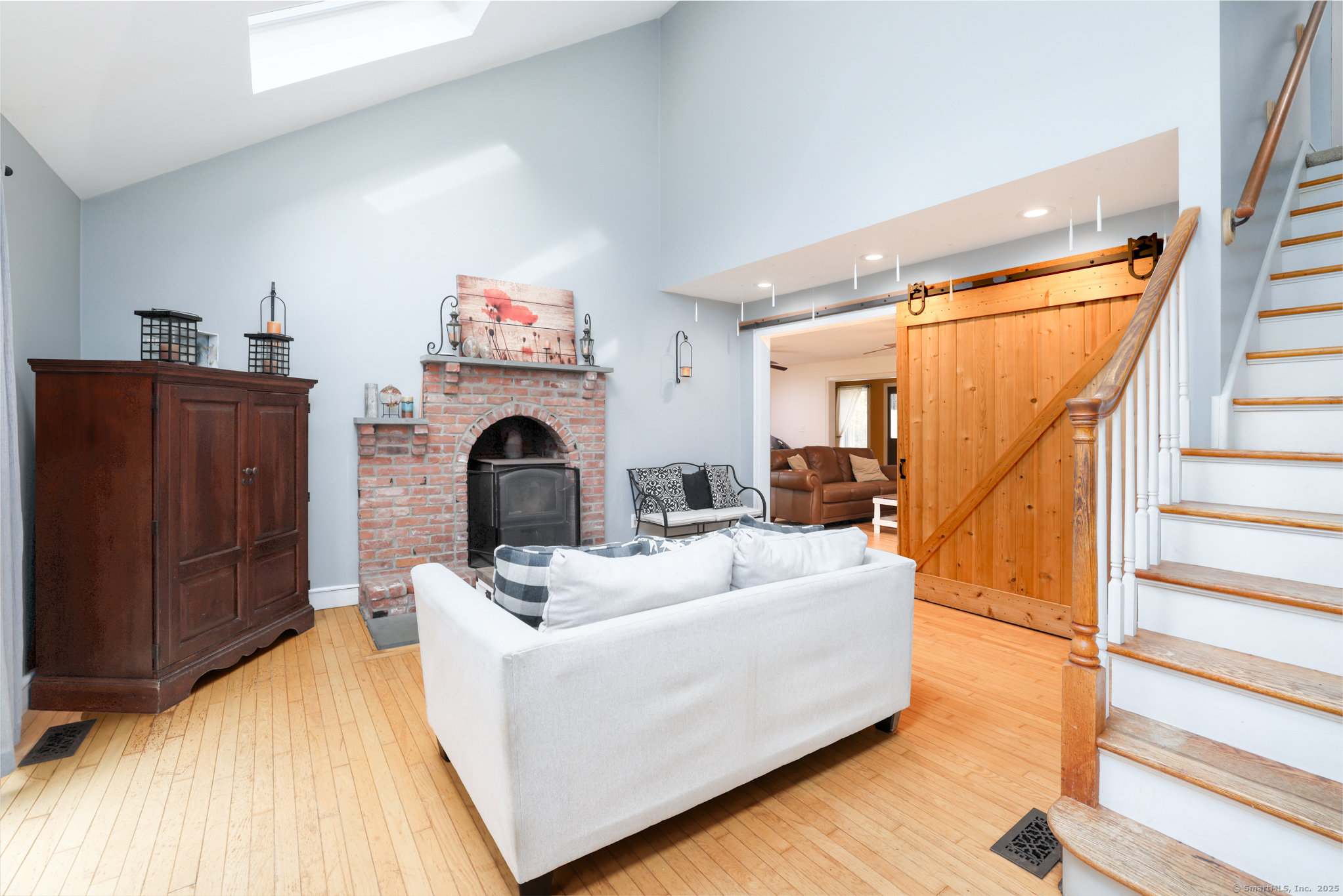 266 Old Forge Road Riverton, CT 06065 - Photo 11 of 40 a living room with furniture and a fireplace