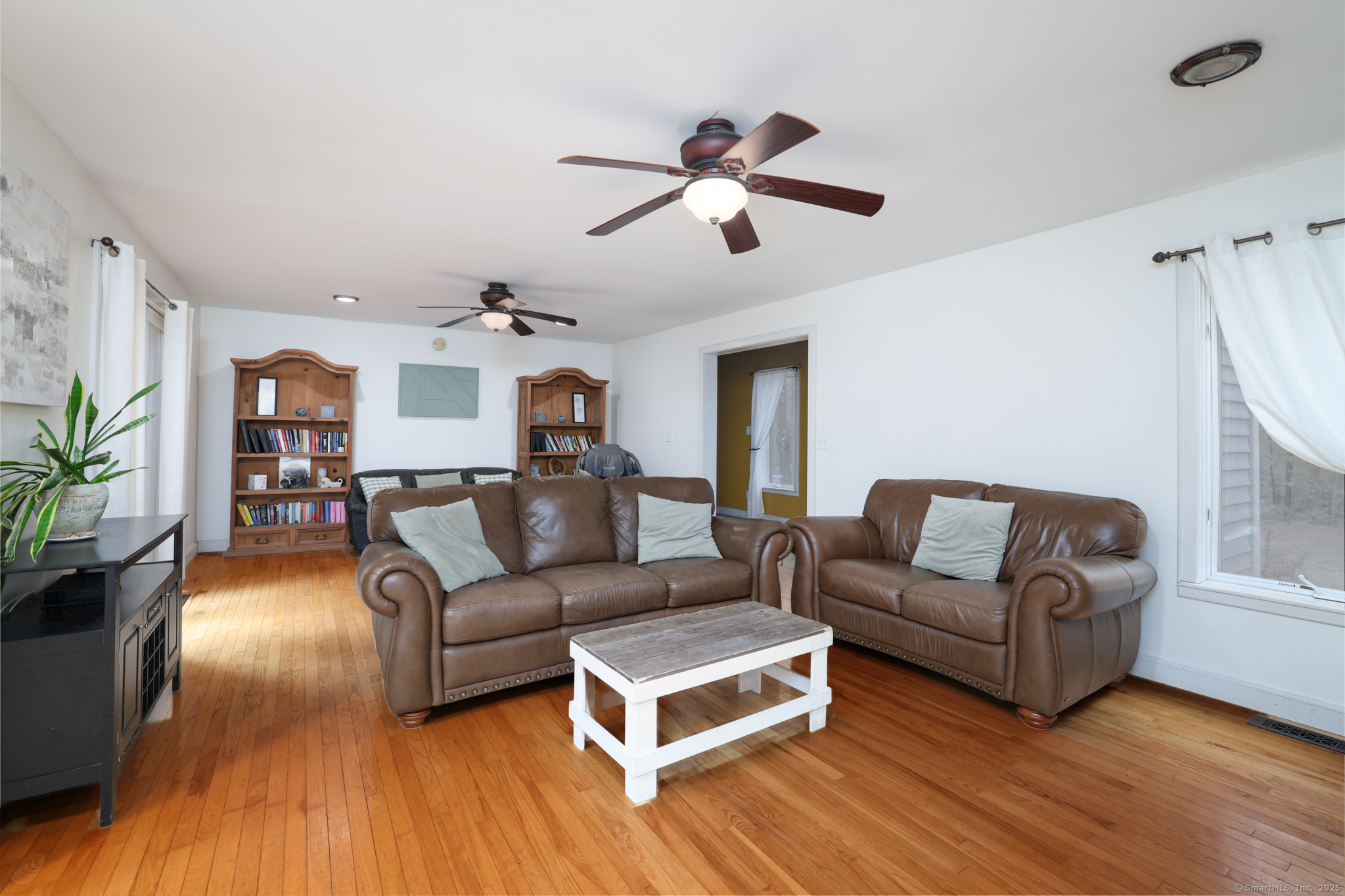 266 Old Forge Road Riverton, CT 06065 - Photo 6 of 40 a living room with furniture and a wooden floor