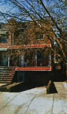 a view of swimming pool with seating space