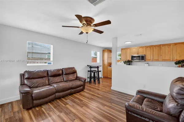 a living room with furniture and a window