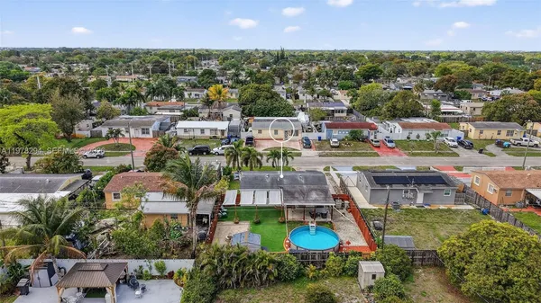 an aerial view of residential building with outdoor space