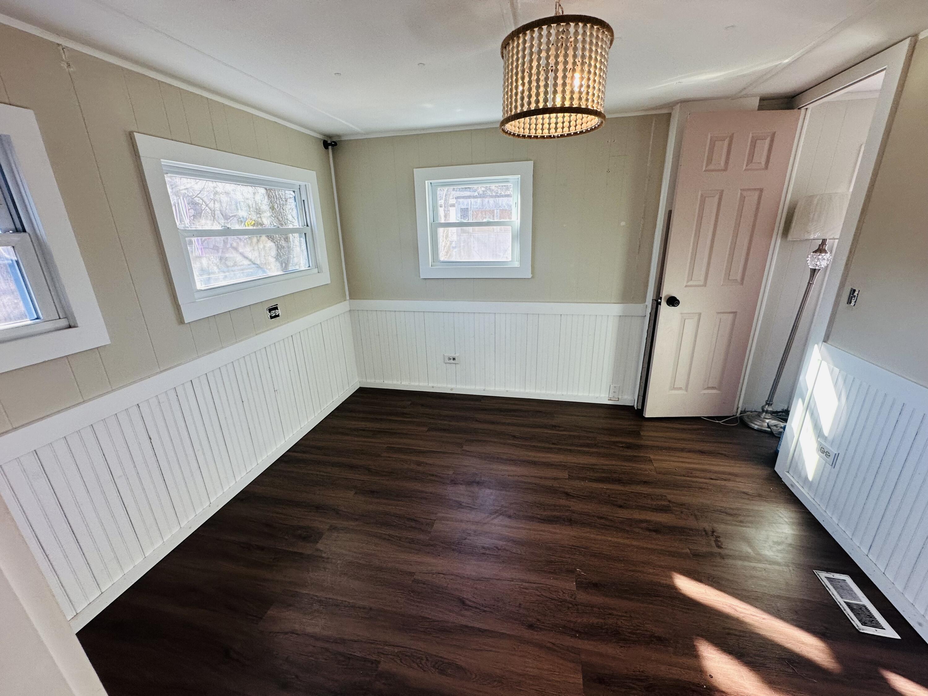 5 3rd Avenue Bourne, MA 02559 - Photo 7 of 18 a view of entryway with wooden floor
