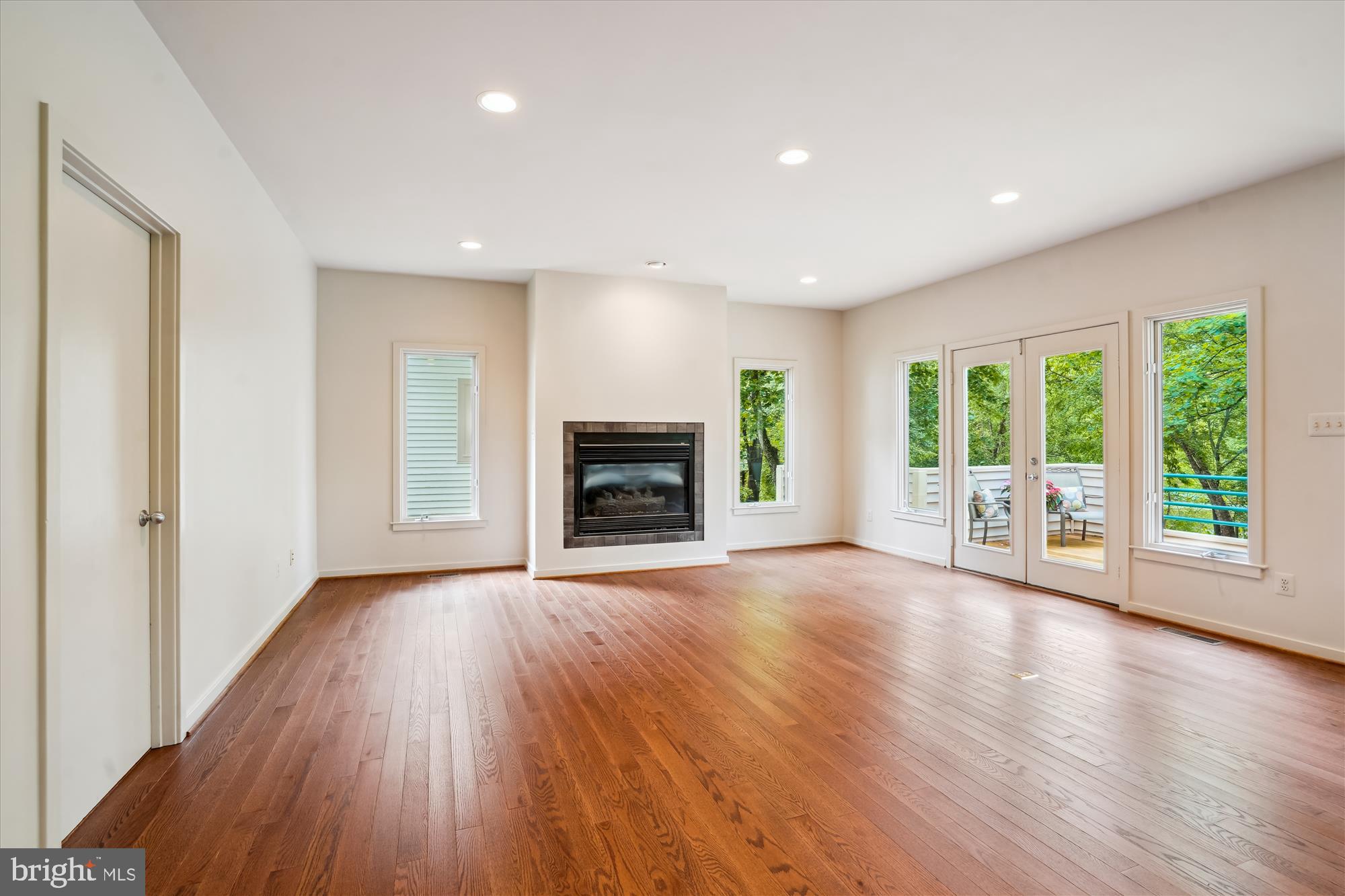 1145 Water Pointe Lane Reston, VA 20194 - Photo 10 of 94 Family Room with double doors to deck