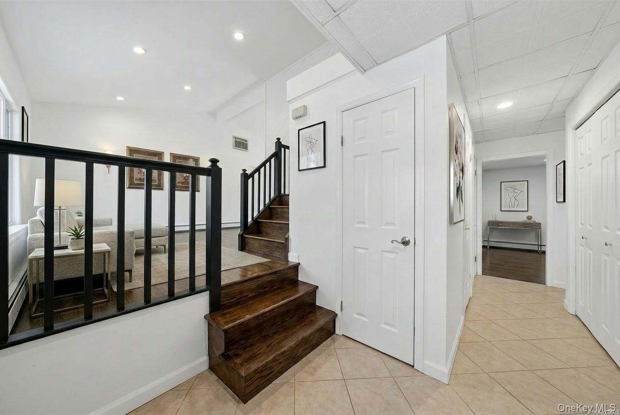 449 West Mombasha Road Monroe, NY 10950 - Photo 20 of 39 a view of entryway with stairs and a chandelier