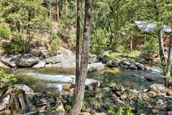 a view of lake with green space