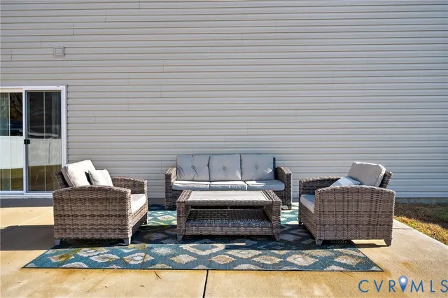 a view of barbeque area with brick wall