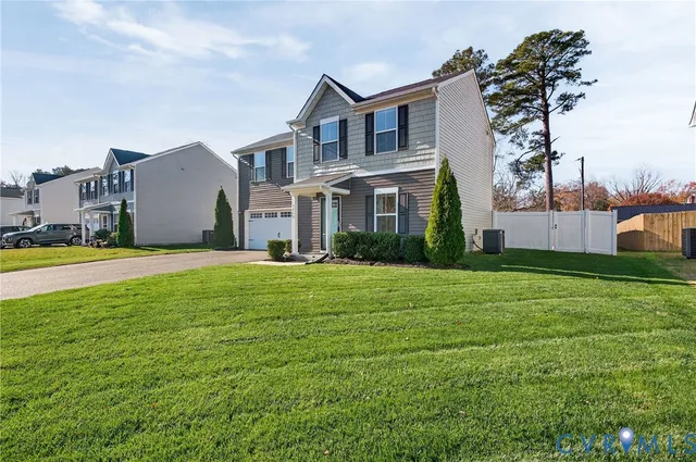 a house view with a garden space