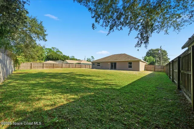 a view of an outdoor space and a yard