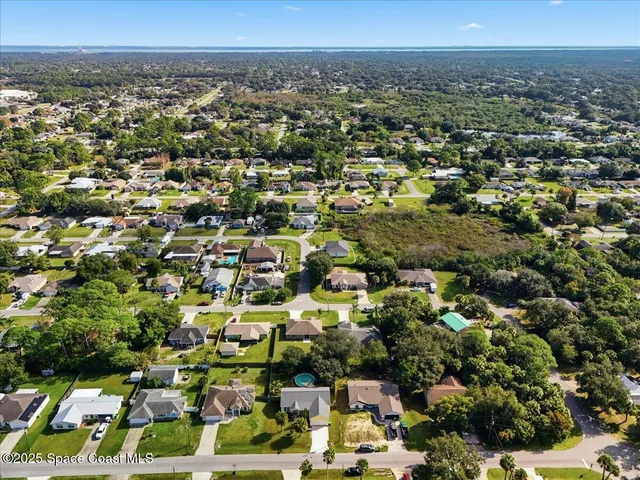an aerial view of multiple house
