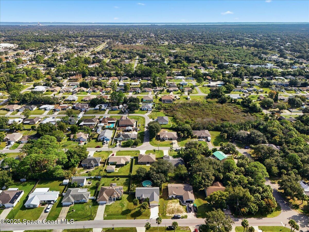 6424 Muller Avenue Cocoa, FL 32927 - Photo 30 of 33 an aerial view of multiple house