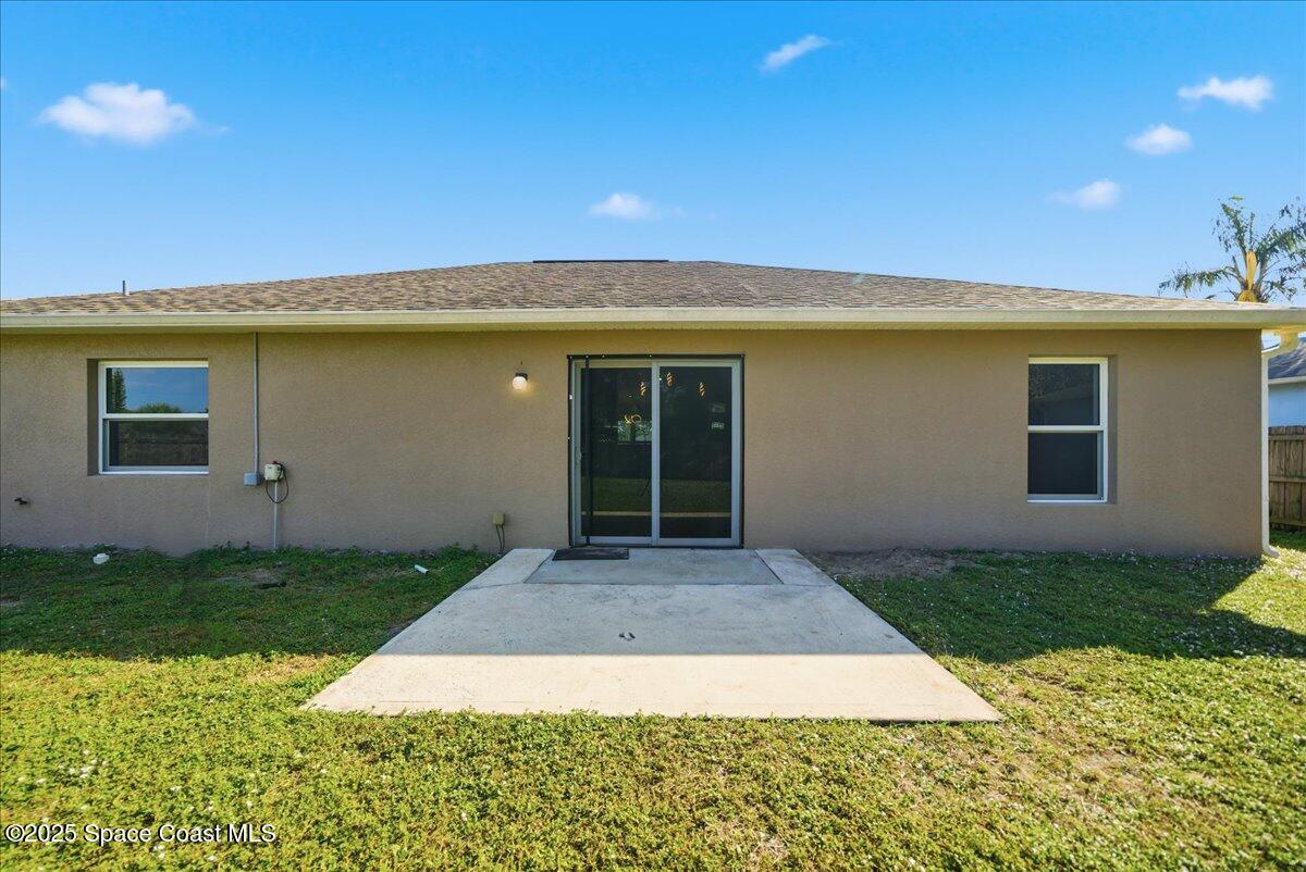 6424 Muller Avenue Cocoa, FL 32927 - Photo 32 of 33 a front view of a house with a yard