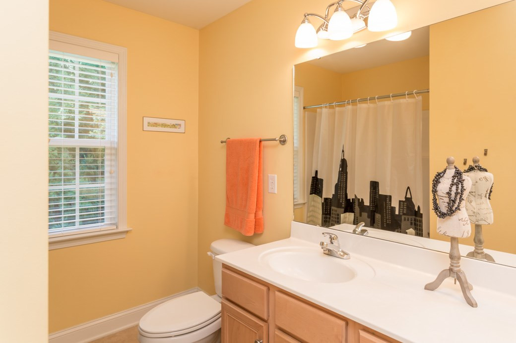 7604 Rambeau Circle Raleigh, NC 27613 - Photo 19 of 25 Full bathroom upstairs along with a master's en suite bath. Double sinks and a linen closet ! Bathroom