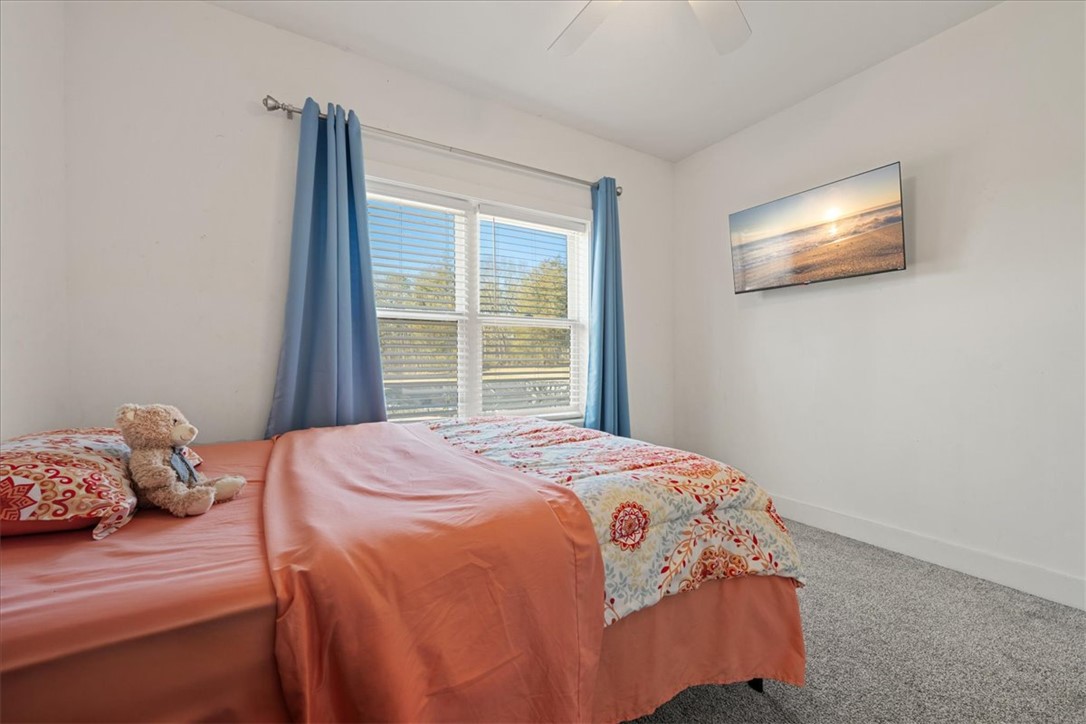 212 Winding Lane Seneca, SC 29672 - Photo 24 of 47 This cozy bedroom features a large window with ample natural light.
