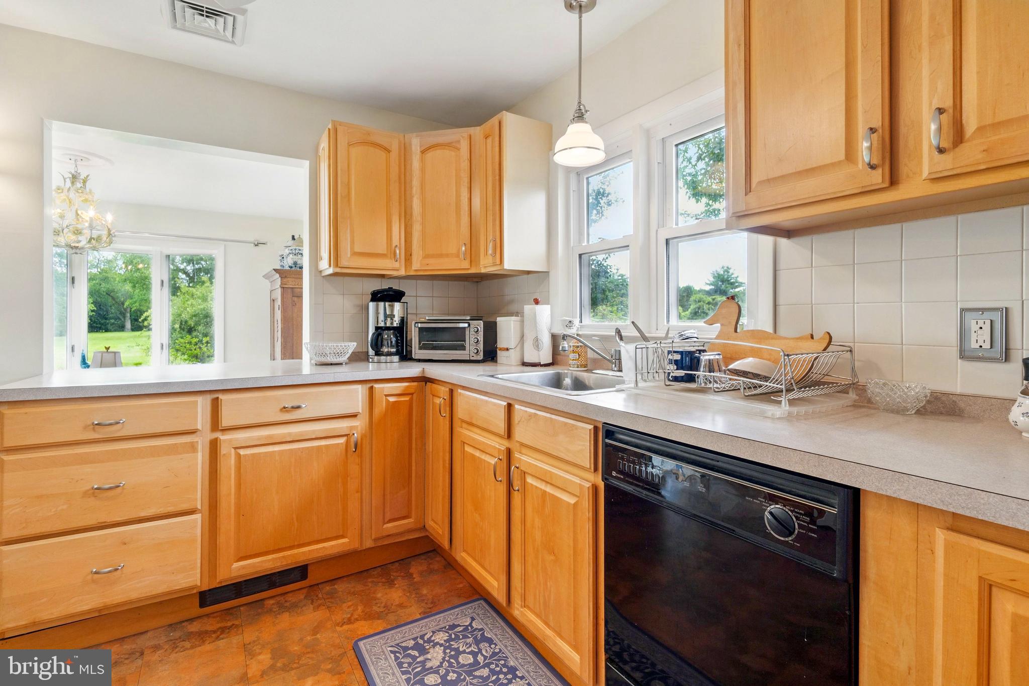 300 Hickory Lane Chestertown, MD 21620 - Photo 13 of 30 a kitchen with stainless steel appliances granite countertop a sink stove and cabinets